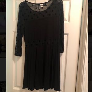 Black dress with sheer polka dot pattern